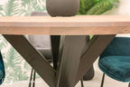 Ronde eettafel DREAUM van massief eiken hout en staal - bruin en zwart